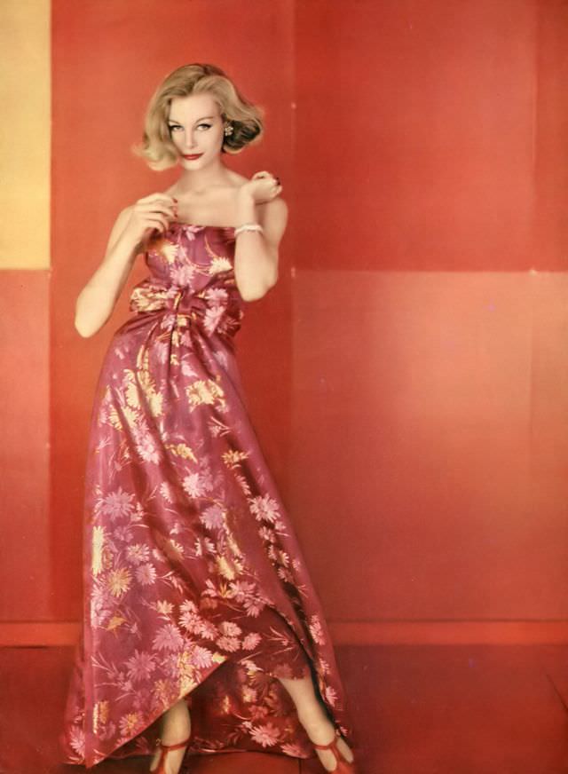 Monique Chevalier in silk-satin chrysanthemum-printed evening gown. Vogue, 1958