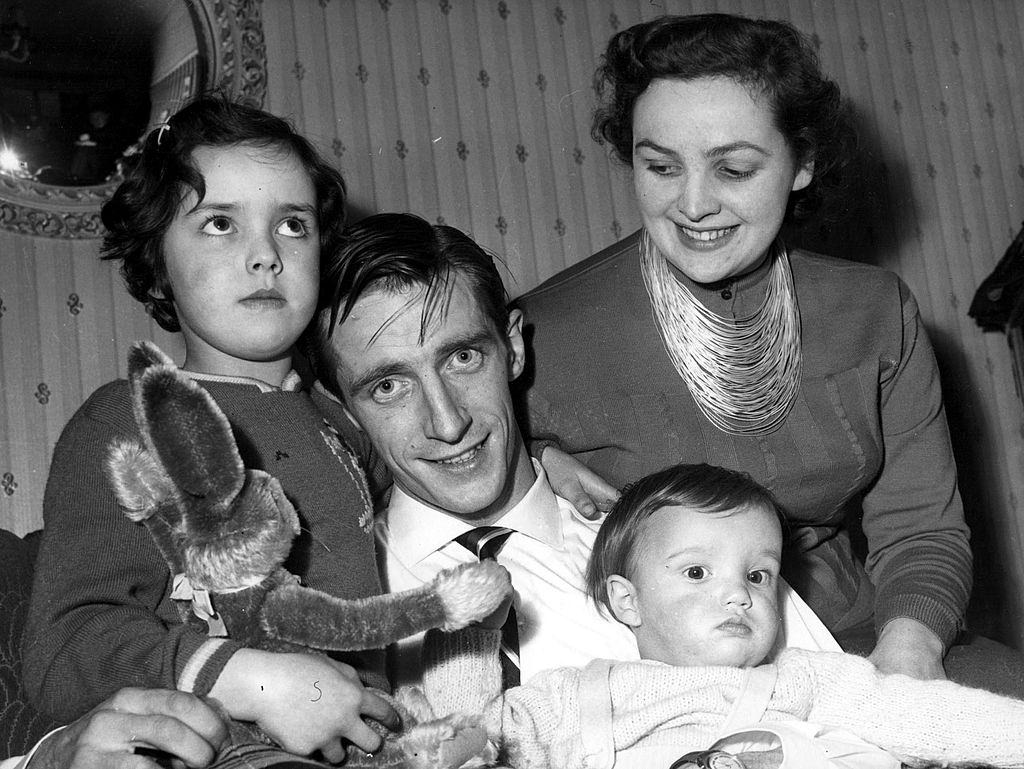 Manchester United Munich air crash survivor Dennis Viollet with his wife Barbara and children.