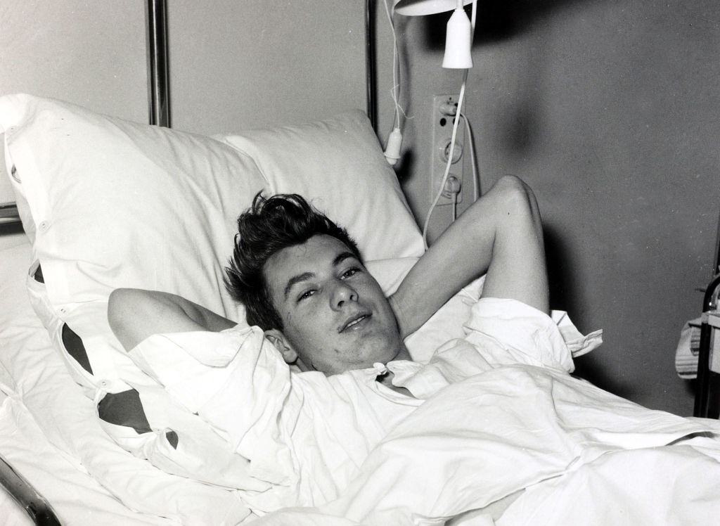 Manchester United's Kenny Morgans recovering in hospital after being injured in the Munich Air Disaster. February 1958