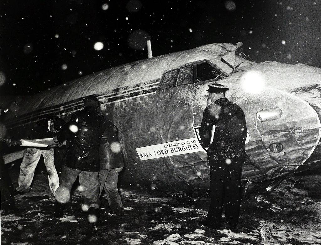 Rescue workers in a snowstorm at the wreckage of the B.E.A. Elizabethan airliner G-ALZU "Lord Burghley" after the crash. 6 February 1958.
