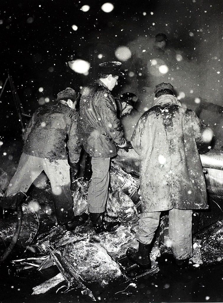 Rescue workers near the crash site at Munich Airport. 6 February 1958.