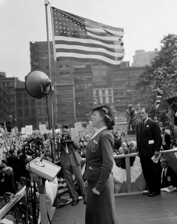 A speaker addresses the crowds in Madison Square.