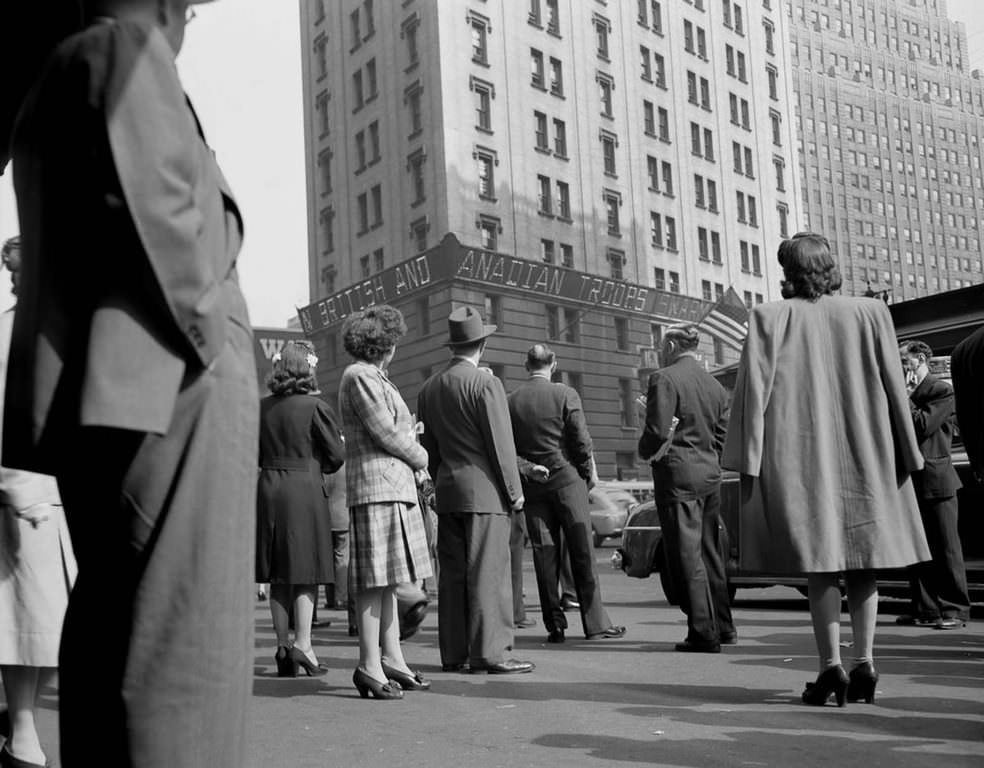 Thousands of people watching the electronic ticker on the New York Times building in Times Square as they waited for the latest reports.