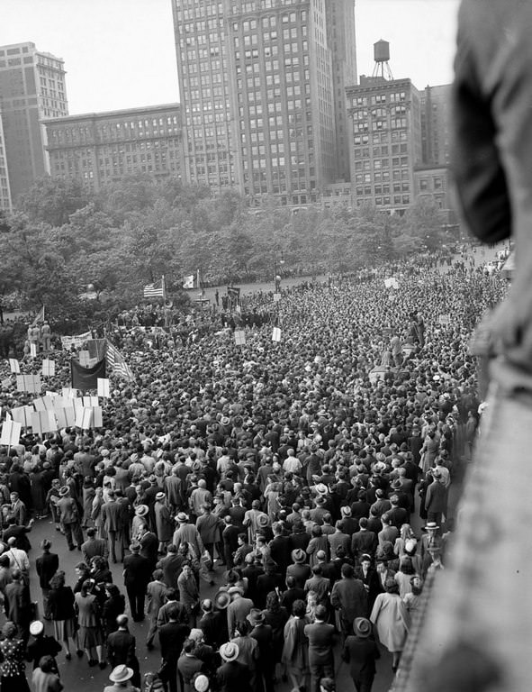 Thousands gather in Madison Square for a rally led by Mayor Fiorello La Guardia.