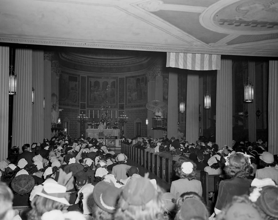 The packed noon mass at St. Vincent de Paul’s church.