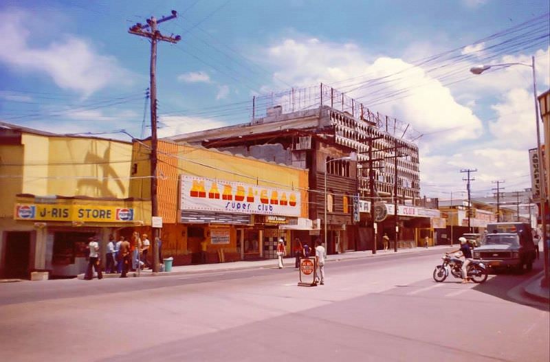 Olongapo street scenes with the burned-out Pauline's Club at right center (it burned in late 1968 or early 1969)