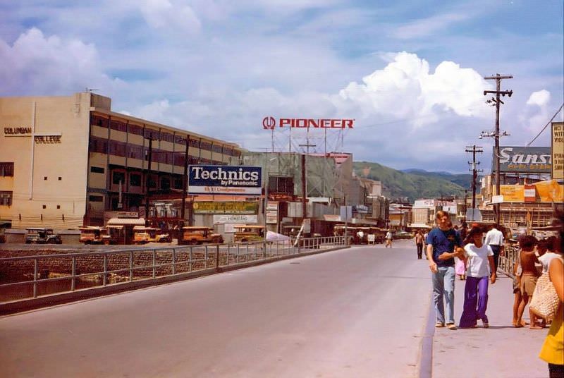 Outside of the NAVBASE Subic Main Gate, looking back across the bridge toward Olongapo