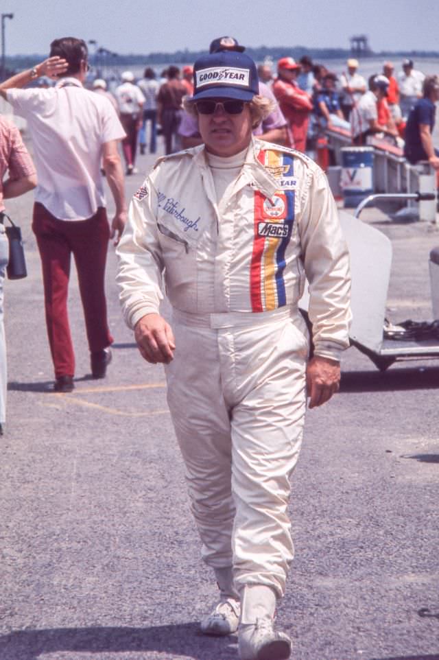 Bill Puterbaugh walks through the pits on race day