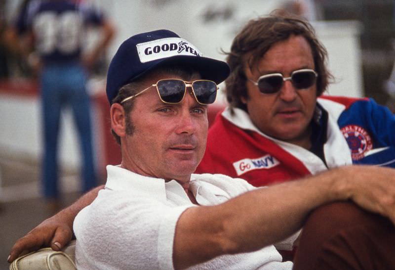 Bob Harkey and a crewman relaxing in the golf cart