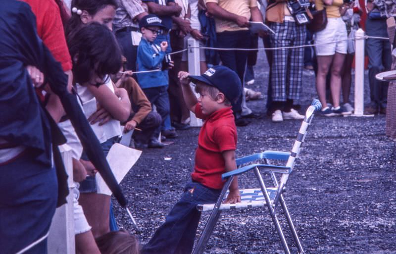 One of the younger drivers in the autograph area