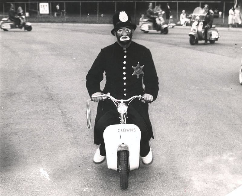 A clown in a police officer's uniform.