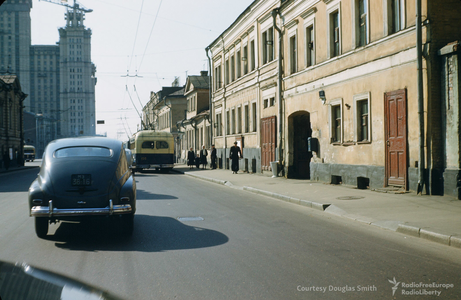 Driving up Moscow's Bolshaya Nikitskaya ulitsa, with the Stalinist skyscraper on Kudrinskaya ploshchad rising in background.