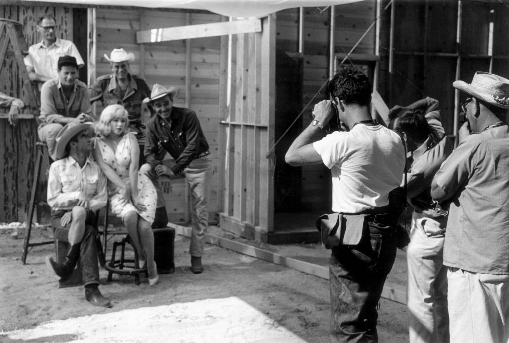 The cast and crew of John Huston's 'The Misfits' line up for a publicity shoot.