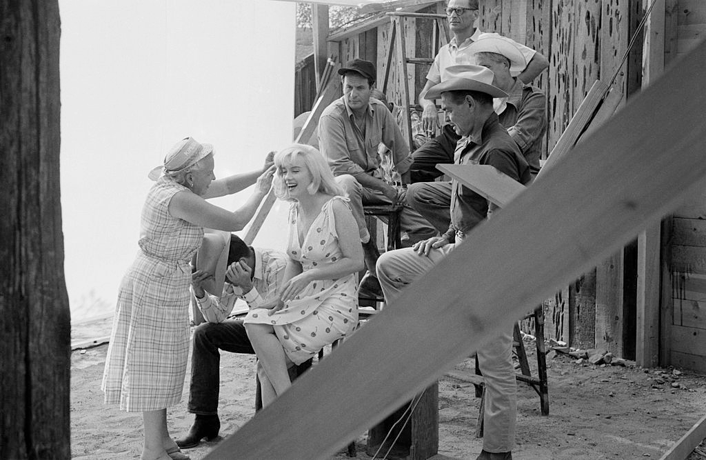 The cast and crew of John Huston's 'The Misfits' line up for a publicity shoot.