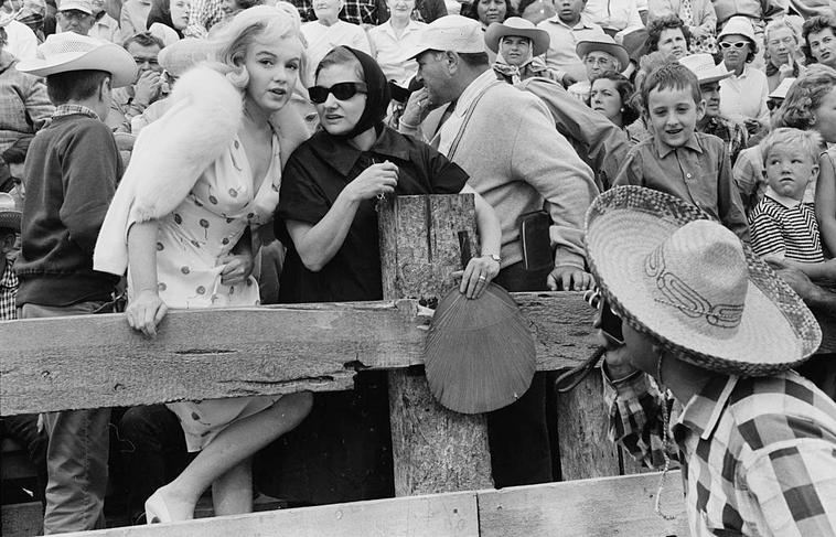 Marilyn Monroe with her acting coach Paula Strasberg, during the location shoot of 'The Misfits'