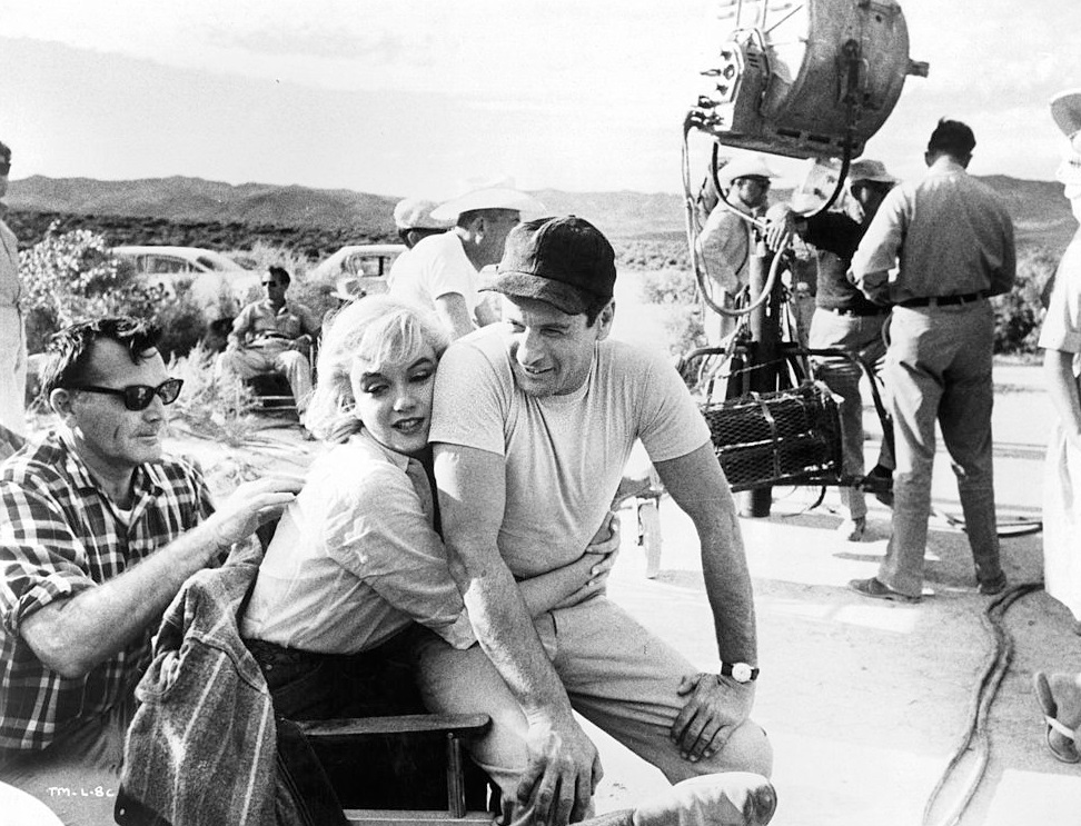Marilyn Monroe hugging Eli Wallach on the set of the film 'The Misfits', 1961.