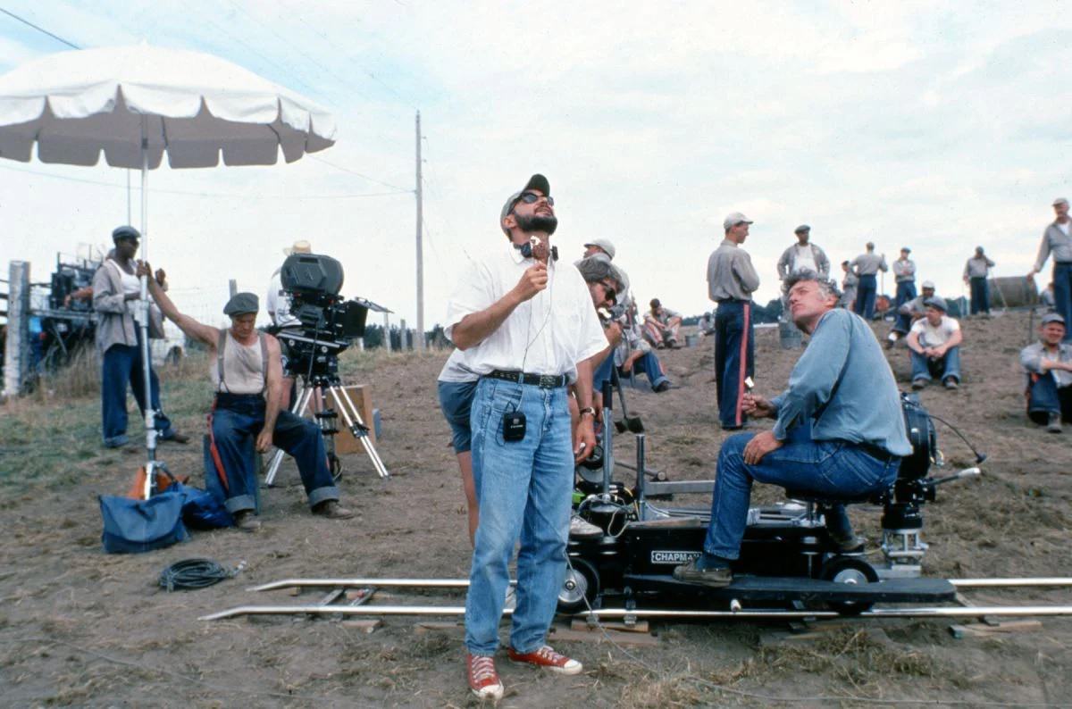 Taking a brief ice cream break, Deakins and Darabont consider their daylight.