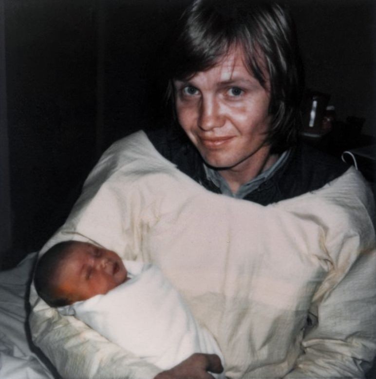 Actor Jon Voight holds his new born baby Angelina Jolie, 1975.