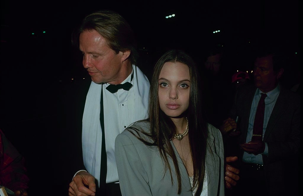 Angelina Jolie with her father Actor Jon Voight, 1990.