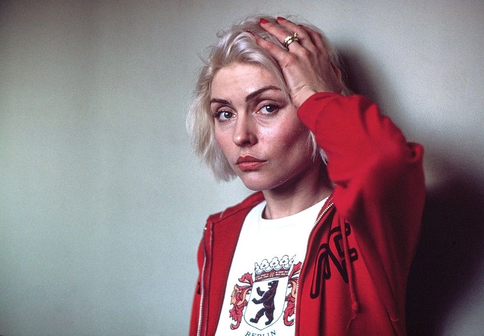 Debbie Harry as she poses woth one hand on her head, 1979.