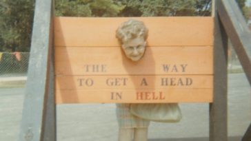 Hilarious Vintage Photos of Women Posing with Funny Objects and Signs