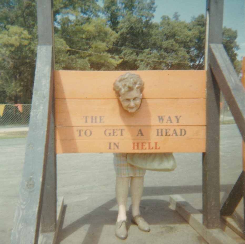 Hilarious Vintage Photos of Women Posing with Funny Objects and Signs