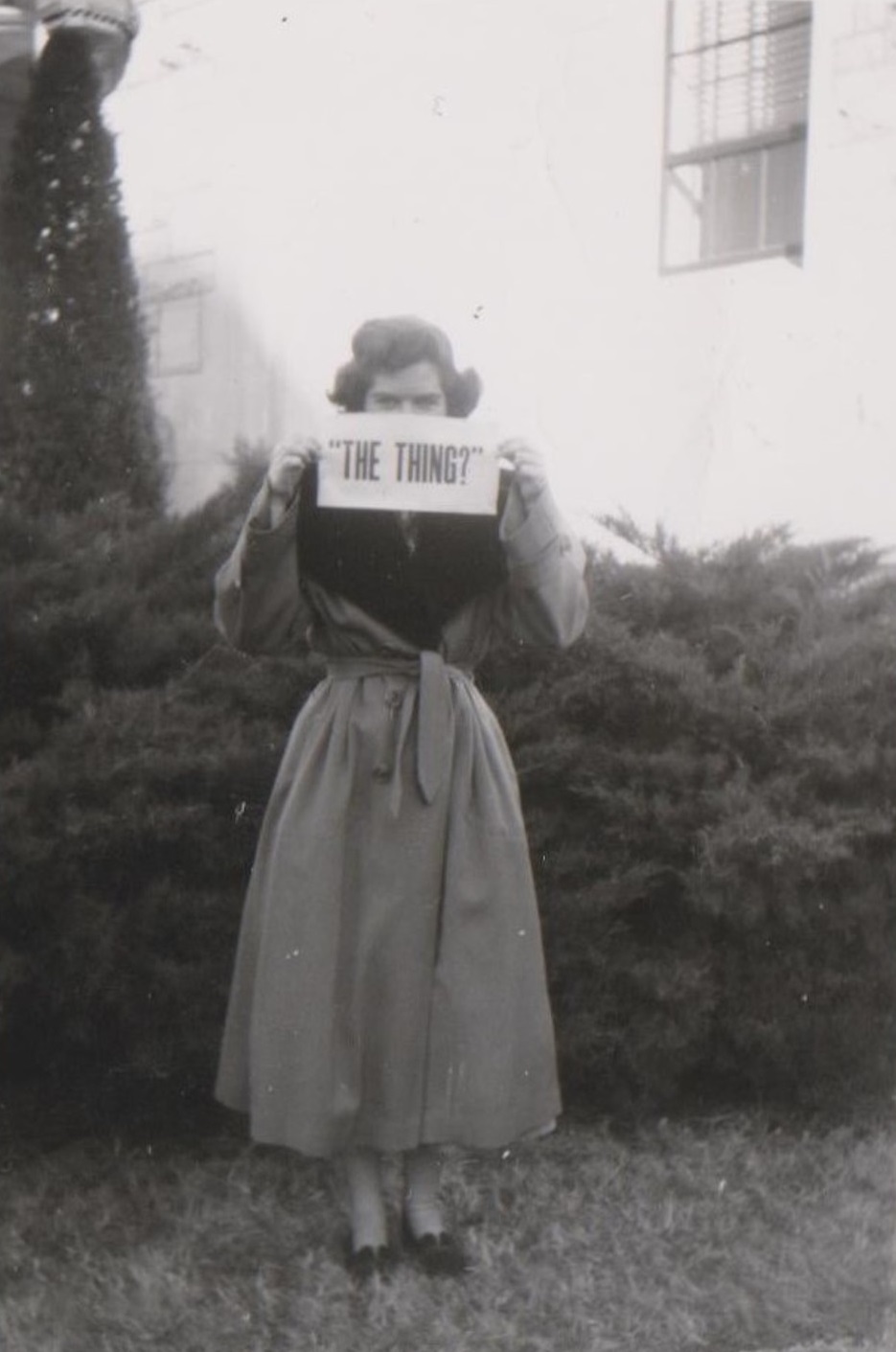 Hilarious Vintage Photos of Women Posing with Funny Objects and Signs