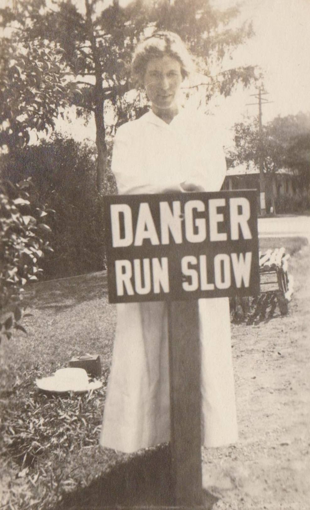 Hilarious Vintage Photos of Women Posing with Funny Objects and Signs