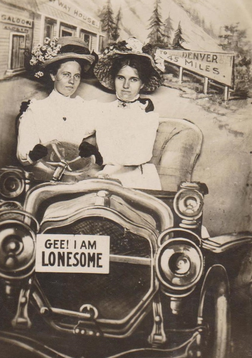 Hilarious Vintage Photos of Women Posing with Funny Objects and Signs