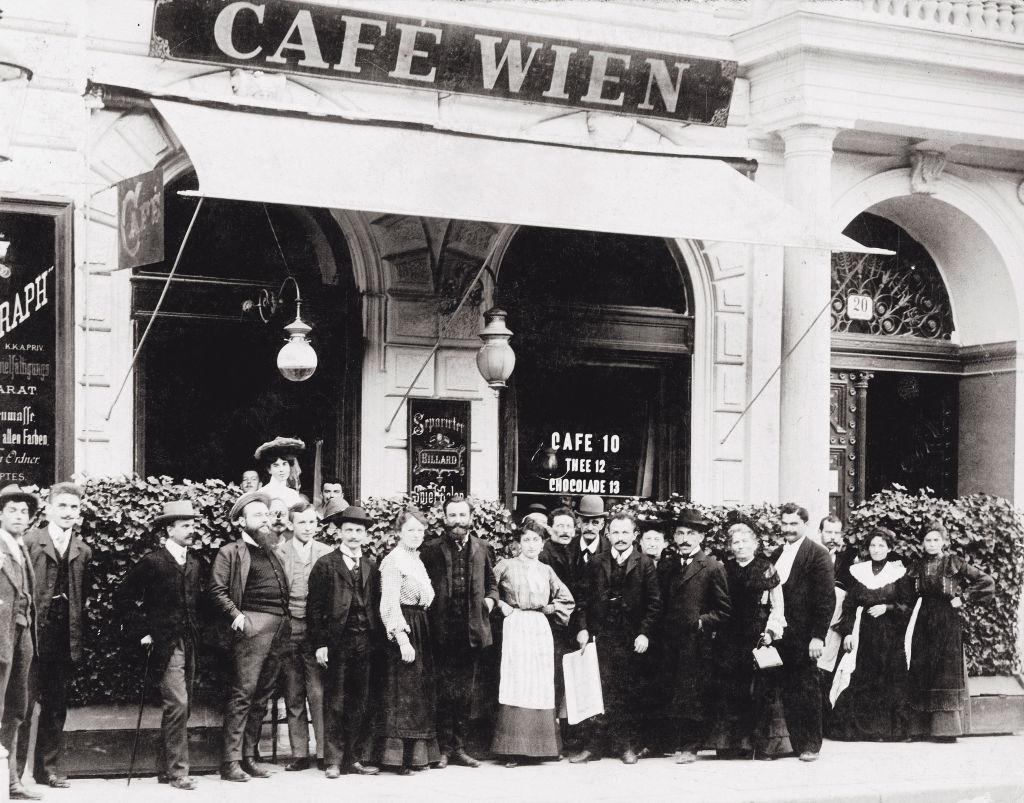 Grou pportrait of Staff and Guests of Cafe Wien. Austria, 1904.