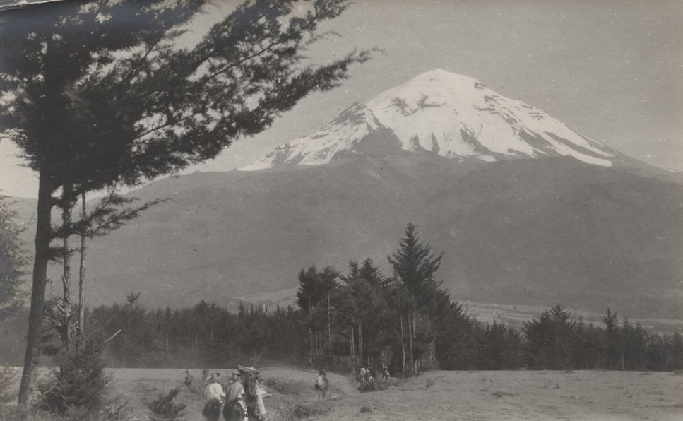 Men on horses with mountain in background, Mexico, 1900s