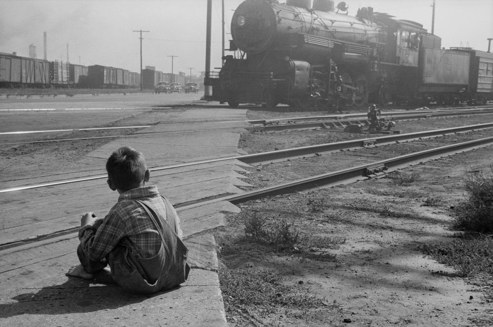Child who lives on the other side of the tracks, Minneapolis, 1930s.