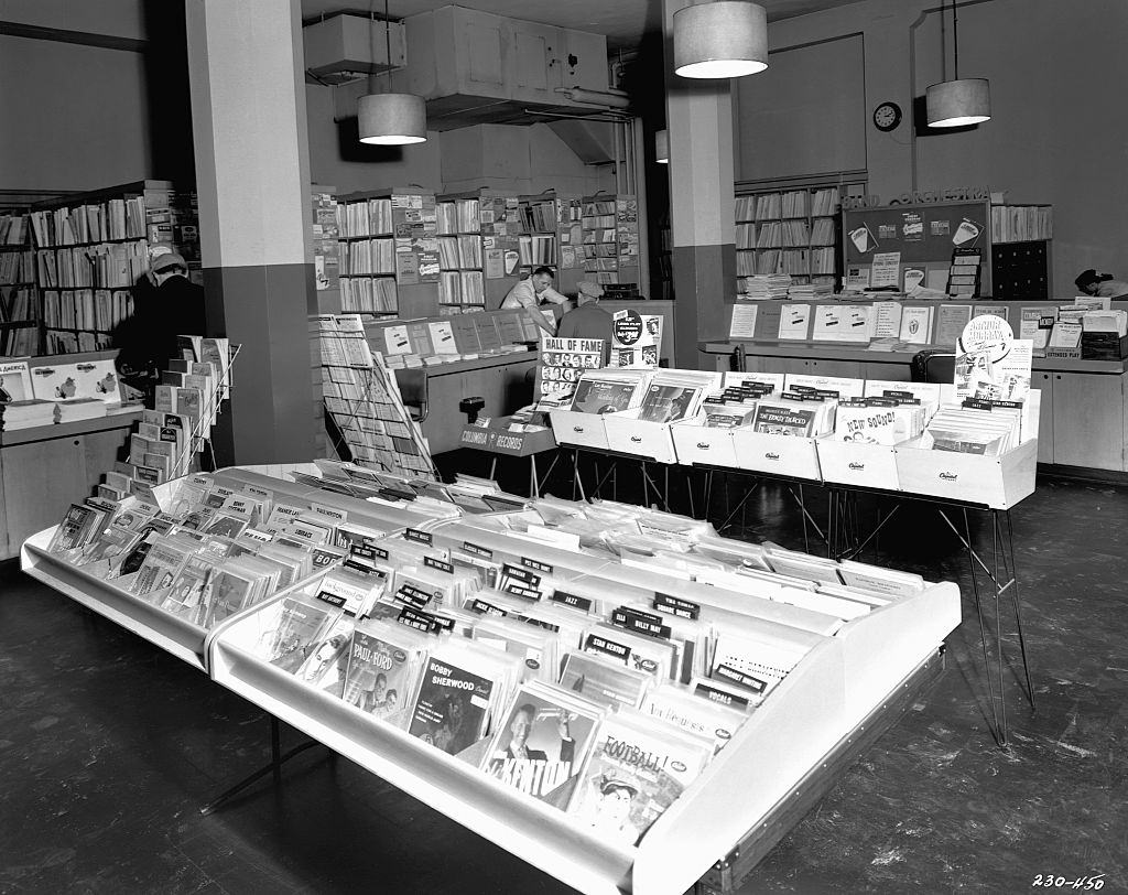 78 and 33 rpm records fill the sales bins at a music store in Minneapolis, 1930.