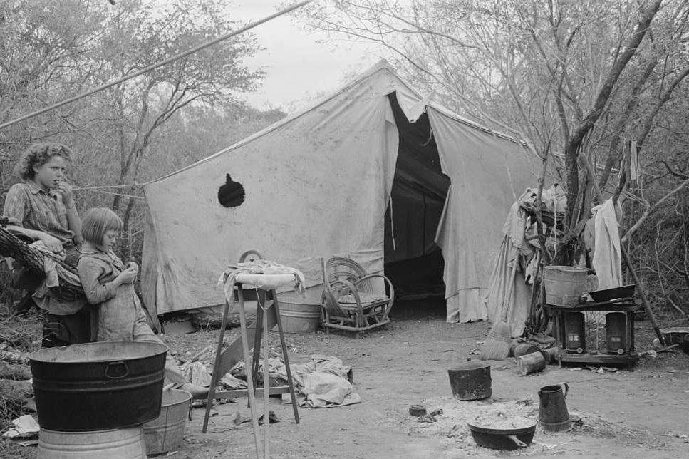 Tent home of white migrant from Arizona, near Harlingen, Texas