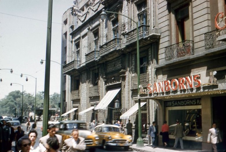 Street scene showing Sanborns. Mexico City, 1957