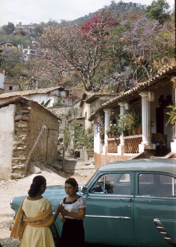 Girls and car. Taxco, 1957