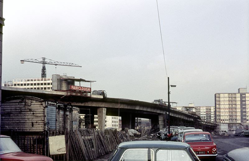 The elevated section of the Mancunian Way under construction in 1966.