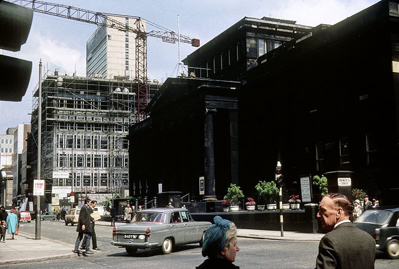 View along Mosley Street towards Piccadilly from the junction with Princess Street in 1966.