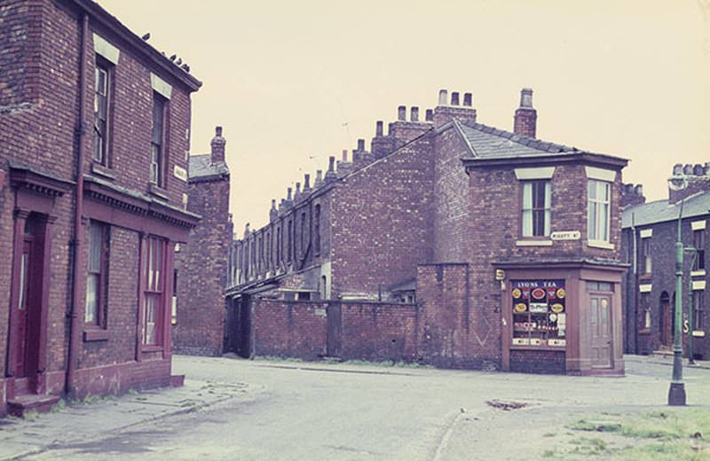 Corner shop and terraced housing in Hulme c. 1967.