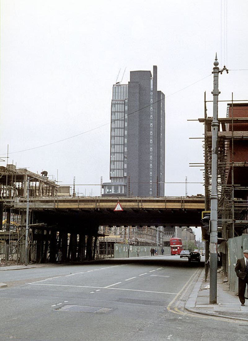 Oxford Road from the junction with Booth Street during the construction of the University of Manchester's Precinct Centre in 1969.