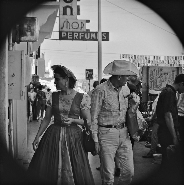 American tourists on street in Tijuana, 1964