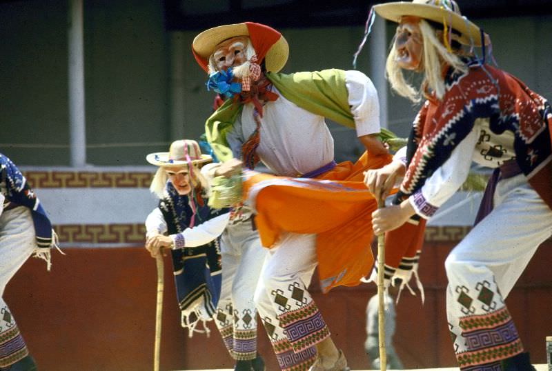 Men wearing masks performing.