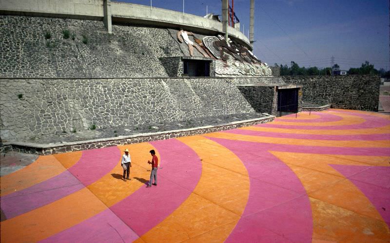 16-year-old Olympic Stadium being refurbished including a colored apron which directs crowds to the entrances.