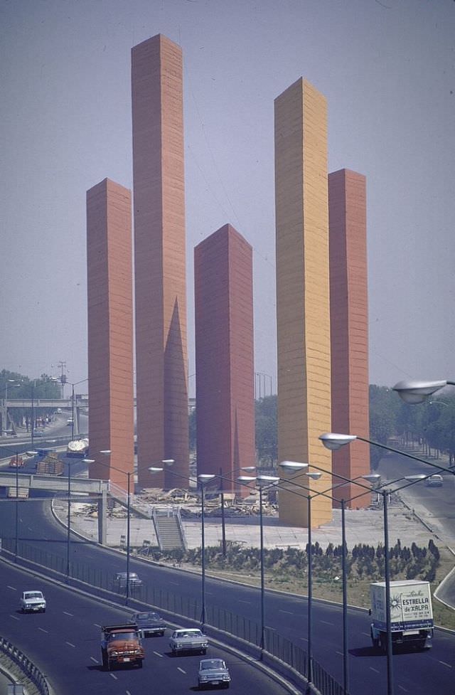 Structures rising high above Satellite City, 1968
