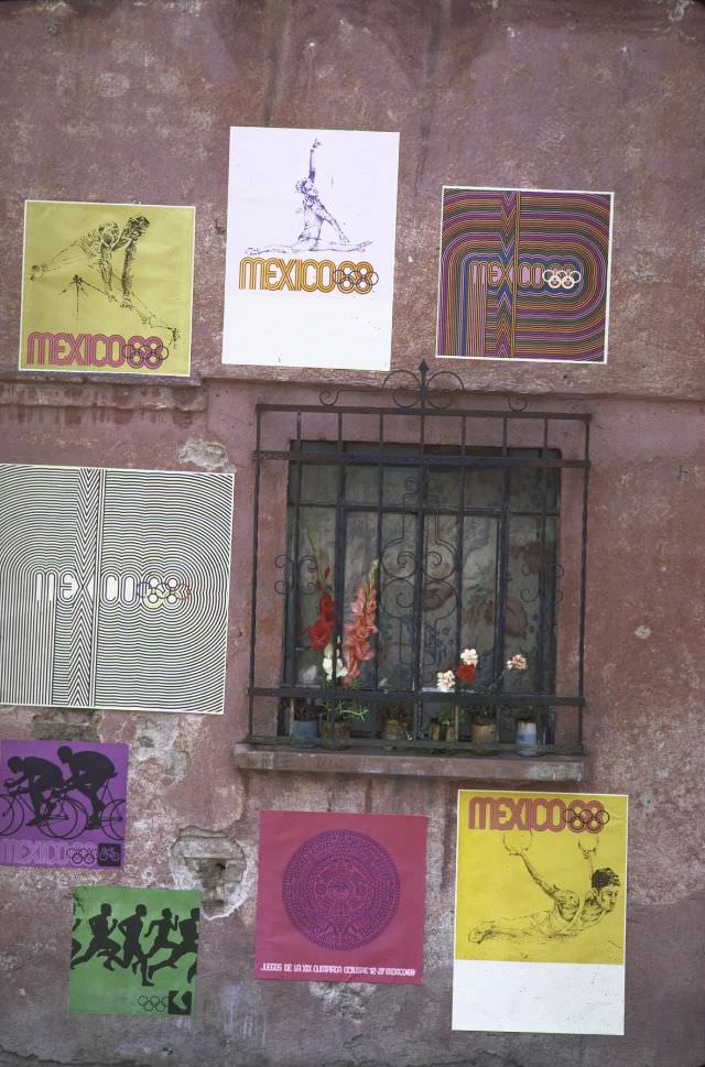 Olympic posters decorating a wall, 1968