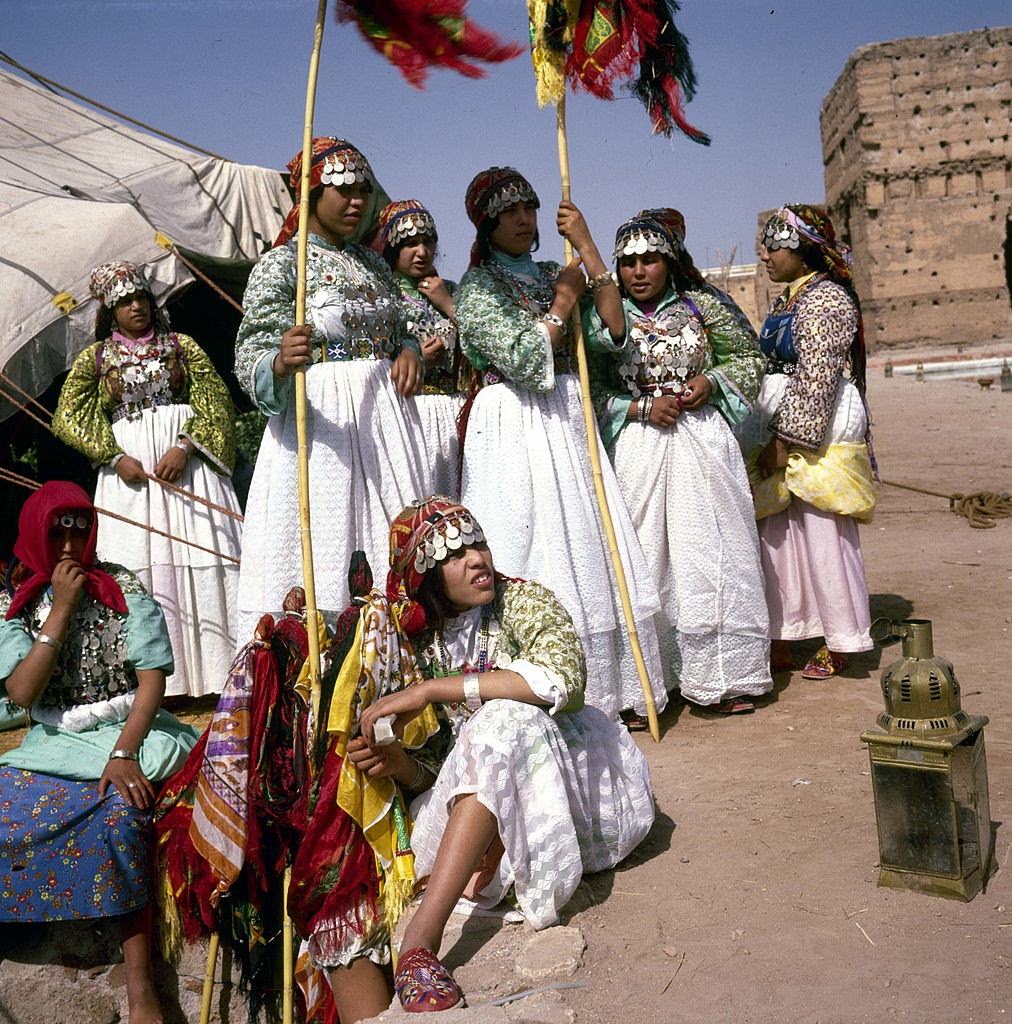 Women in traditional costumes in Imintanoute. Marrakech, 1960.