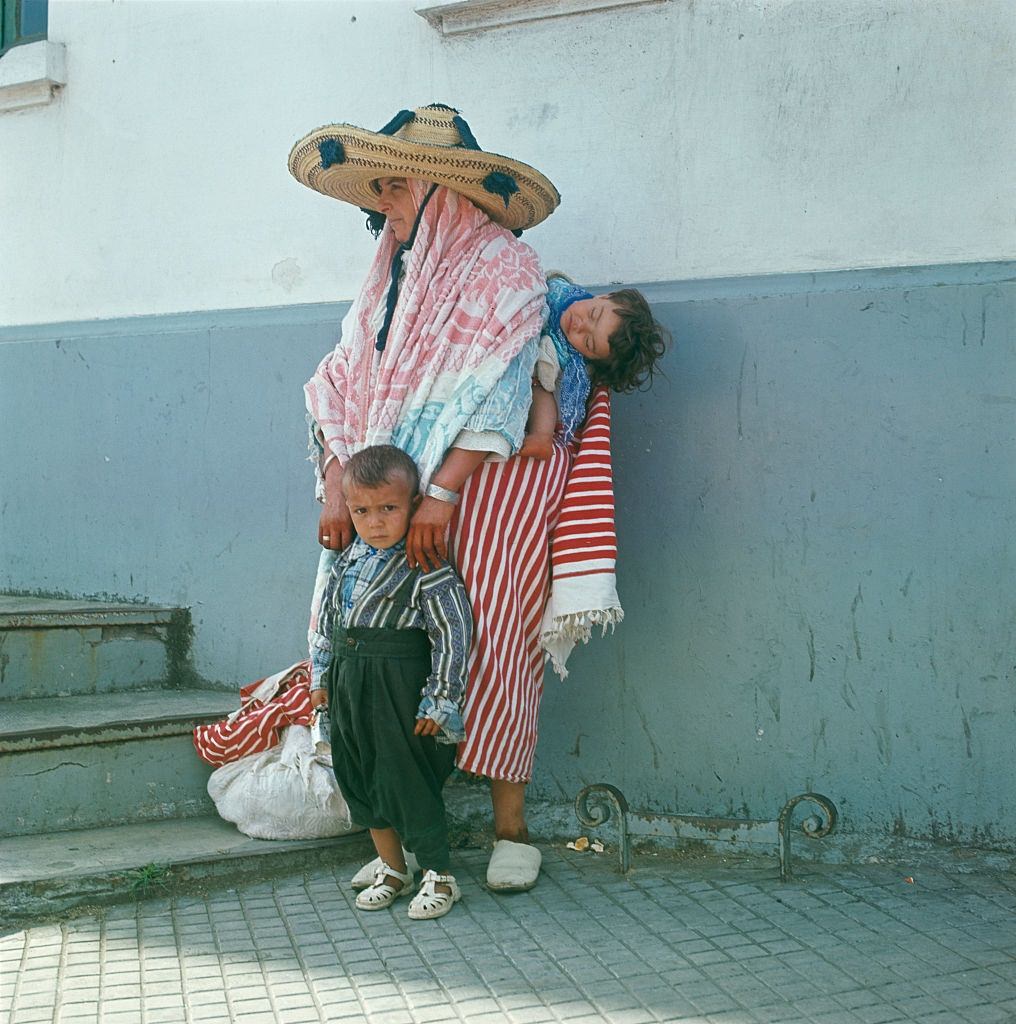 A woman wearing a sombrero-style straw hat in Fez, Morocco, 1965.