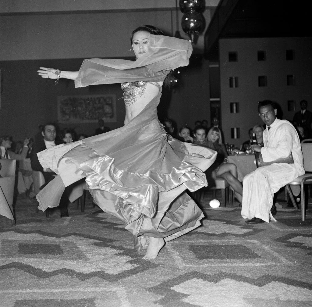 Belly dancer performing at the Hilton Hotel in Marrakech, Morocco in April 1968.