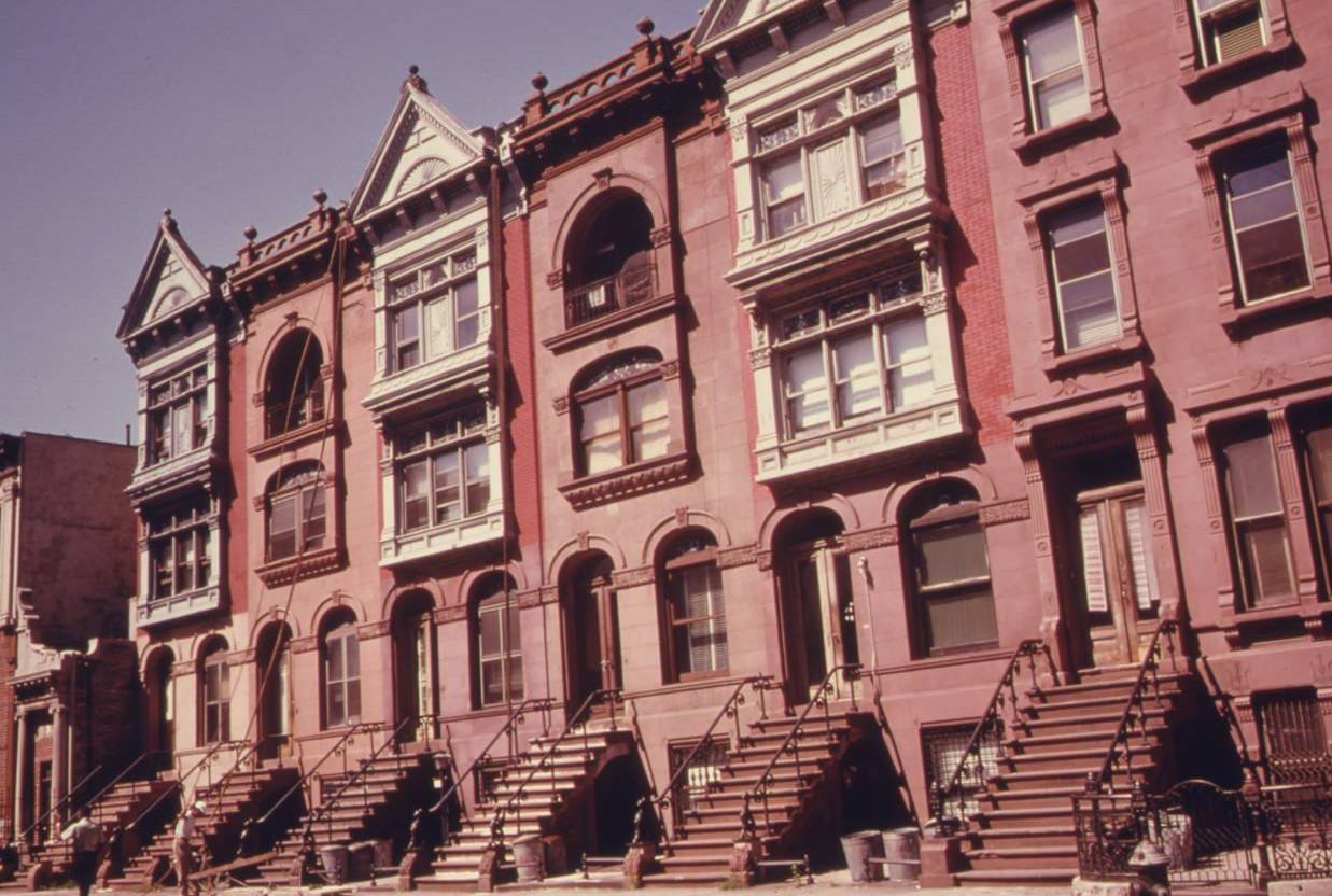 Turn of the century brownstone apartments being gentrified, Brooklyn, July 1974.