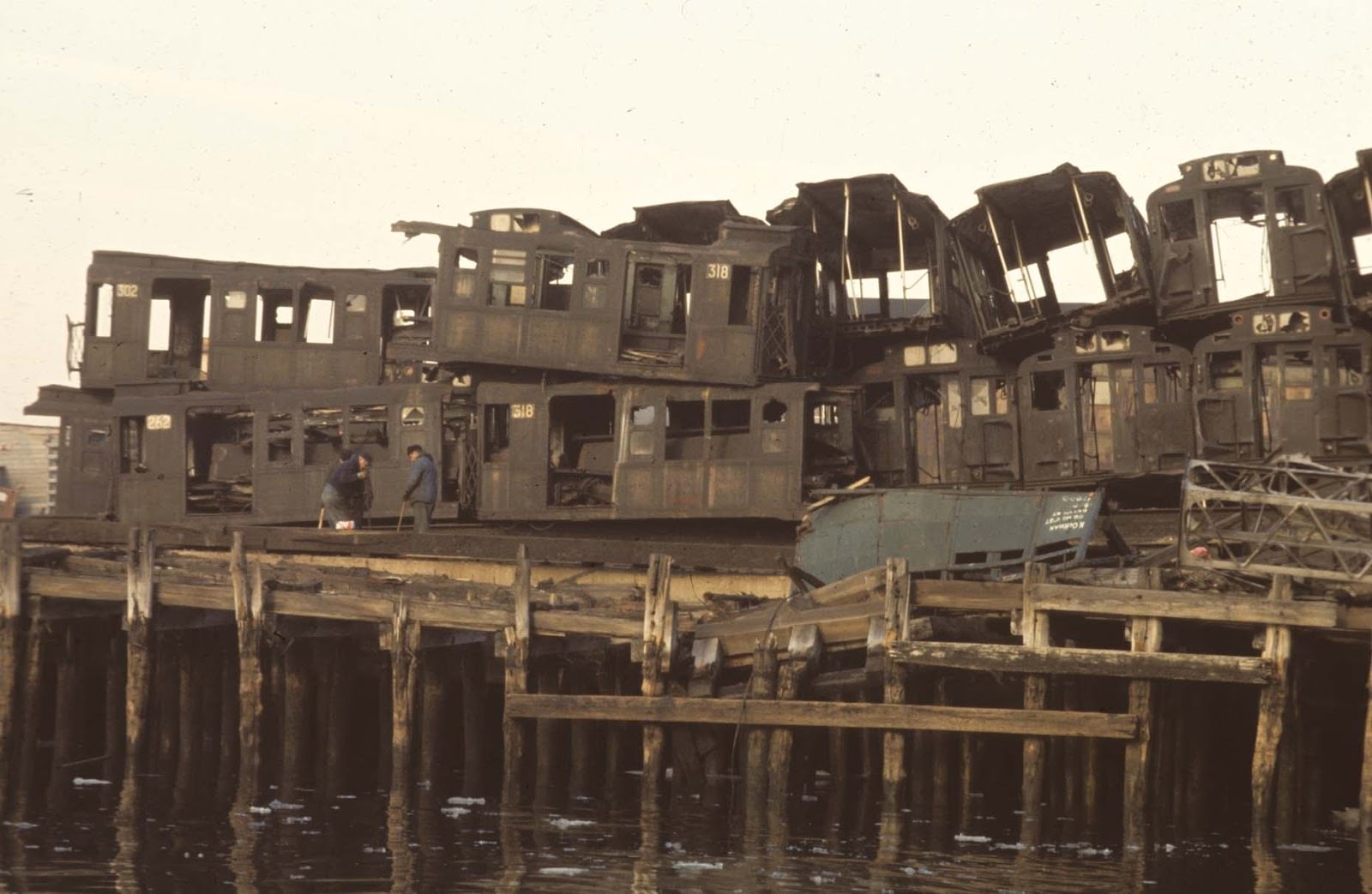 Pier with old subway cars in South Brooklyn, 1970.
